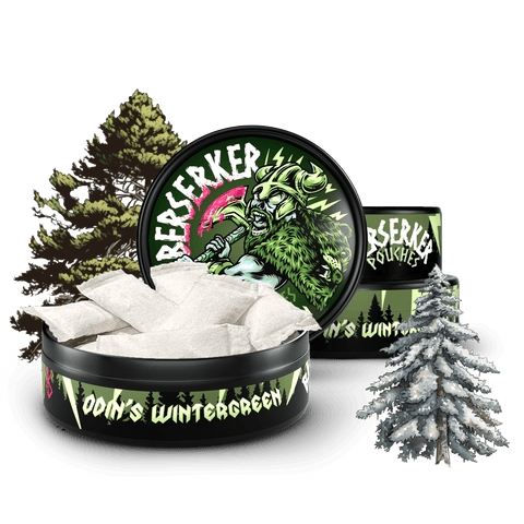 3 can stack of Berserker Odin's Wintergreen caffeine pouches with frozen trees in the background and foreground. The front can is open showing the white discreet energy pouches inside.