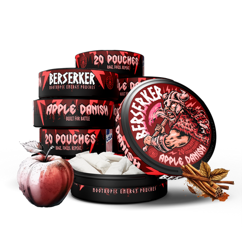 10 can stack of Berserker Apple Danish caffeine pouches with an apple in the background and cinnamon sticks in the foreground. The front can is open showing the white discreet energy pouches inside.